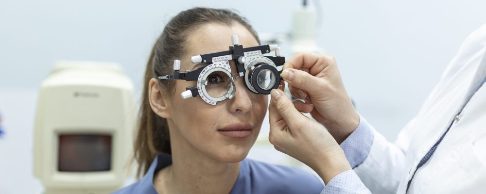 ophthalmologist-examining-woman-with-optometrist-trial-frame-female-patient-check-vision-ophthalmological-clinic-scaled.jpg